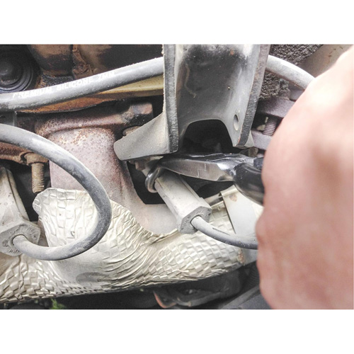 Pince pour retirer les capuchons de bougies d'allumage The Estey Group